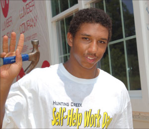  A volunteer contributes labor on a Southern Maryland Tri-county Community Action Committee Self-Help work day.