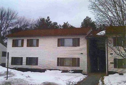 This photo captures the “before” renovations image of one apartment complex in North Country. 