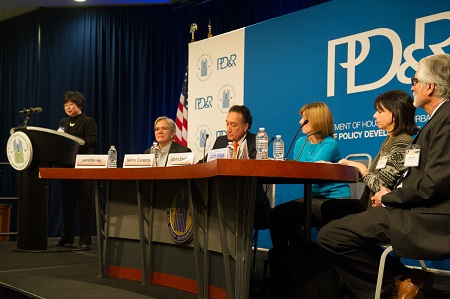 Image shown of Jean Lin Pao with the Visions for Aging in Place panelists (left to right): Jennifer Ho (moderator), Henry Cisneros, Alisha Sanders, Judith Willett, and James Toews.